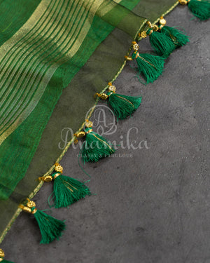 Green Muslin Jamdaani weave with a contrast pink sleeveless blouse