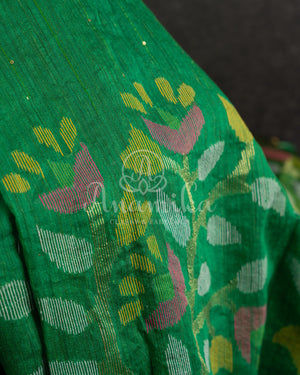 Green Muslin Jamdaani weave with a contrast pink sleeveless blouse