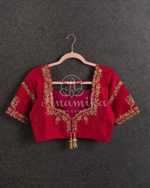 Dark Green Kanchipuram saree with contrast pink gold zari border