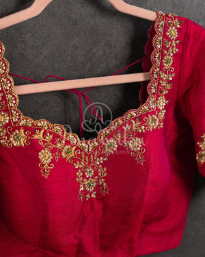 Dark Green Kanchipuram saree with contrast pink gold zari border