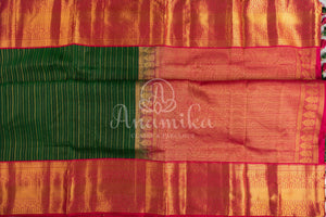 Dark Green Kanchipuram saree with contrast pink gold zari border