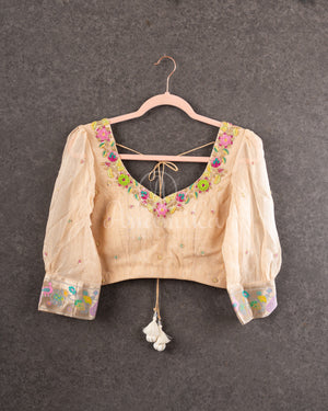 Beige Georgette saree with a paithani border and blouse