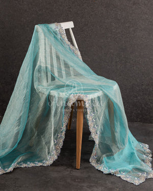 Blue Crush Georgette saree with a beautiful hand embroidered cutwork border