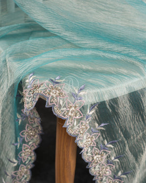 Blue Crush Georgette saree with a beautiful hand embroidered cutwork border