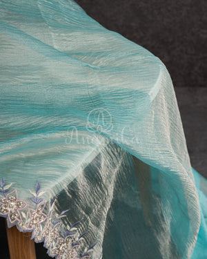 Blue Crush Georgette saree with a beautiful hand embroidered cutwork border