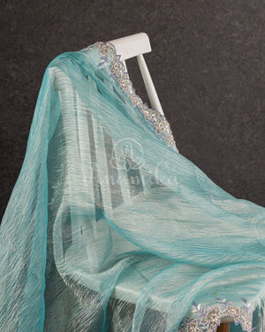 Blue Crush Georgette saree with a beautiful hand embroidered cutwork border