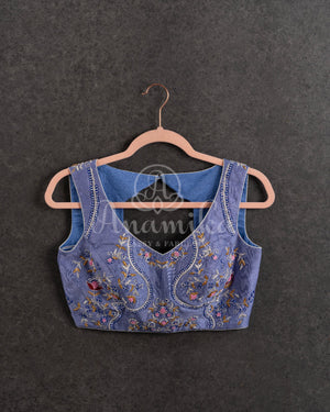 Steel Gray Floral Georgette ruffle saree with a stylish sleeveless blouse