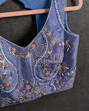 Steel Gray Floral Georgette ruffle saree with a stylish sleeveless blouse