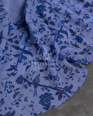 Steel Gray Floral Georgette ruffle saree with a stylish sleeveless blouse