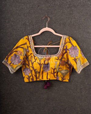 Purple Chanderi Silk Saree with a contrast yellow kalamkari blouse