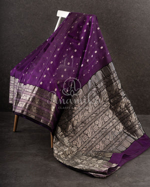 Purple Chanderi Silk Saree with a contrast yellow kalamkari blouse