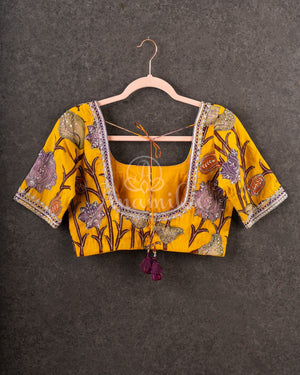 Purple Chanderi Silk Saree with a contrast yellow kalamkari blouse