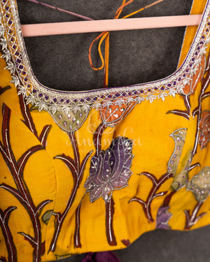 Purple Chanderi Silk Saree with a contrast yellow kalamkari blouse