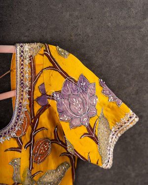 Purple Chanderi Silk Saree with a contrast yellow kalamkari blouse