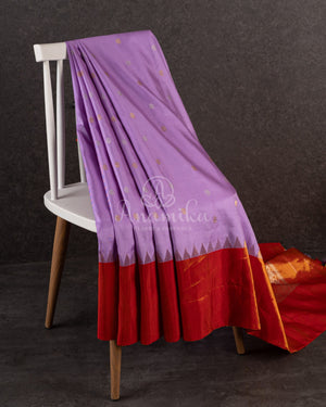 Lavender Gadwal Saree with a contrast reddish gold tissue border