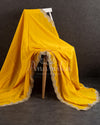 Yellow pure crepe saree with grey heavy work blouse
