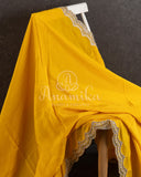 Yellow pure crepe saree with grey heavy work blouse
