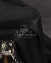 Black Pleated saree with an embroidered border and blouse