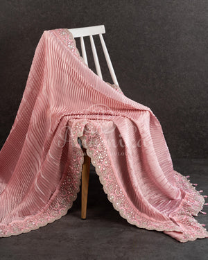 Peach Pink Pleated saree with an embroidered border and blouse