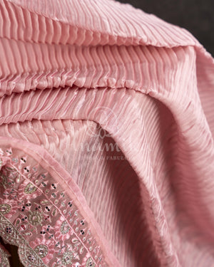 Peach Pink Pleated saree with an embroidered border and blouse