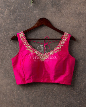 Green Muslin Jamdaani weave with a contrast pink sleeveless blouse