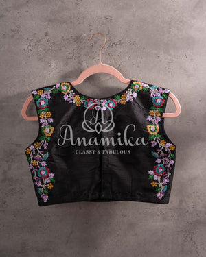 Black sleeveless blouse with multi color cutdana work