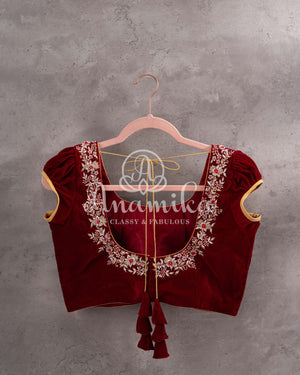 Maroon short sleeves blouse on velvet with gold zardosi work