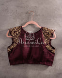 Brown sleeveless blouse with gold zardosi work on shoulders