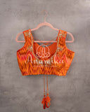 Orange ikkat rawsilk sleeveless blouse with zardosi work