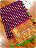 A gadwal Kanchi saree in Purple and maroon red combination