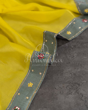 Yellow/Grey Crepe Georgette saree with beautifully designed grey blouse and belt