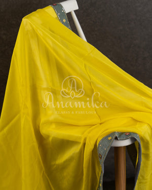 Yellow/Grey Crepe Georgette saree with beautifully designed grey blouse and belt