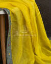Yellow/Grey Crepe Georgette saree with beautifully designed grey blouse and belt