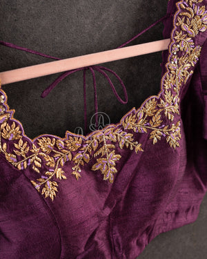 Kanjeevaram saree in Mauve/Plum combo with a grand border and pallu