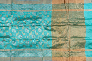Chanderi Pattu saree in blue paired with a contrast pink brocade blouse