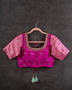 Chanderi Pattu saree in blue paired with a contrast pink brocade blouse