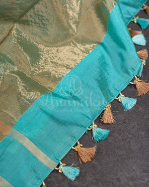 Chanderi Pattu saree in blue paired with a contrast pink brocade blouse