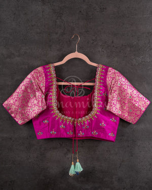 Chanderi Pattu saree in blue paired with a contrast pink brocade blouse