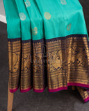 A Gadwal pattu saree in Hues of blue.