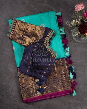 A Gadwal pattu saree in Hues of blue.