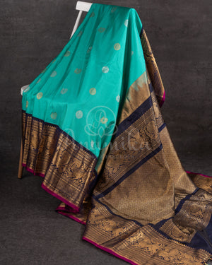 A Gadwal pattu saree in Hues of blue.