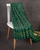 Dark Green Bandini Saree with a Fusion concept Patola Blouse