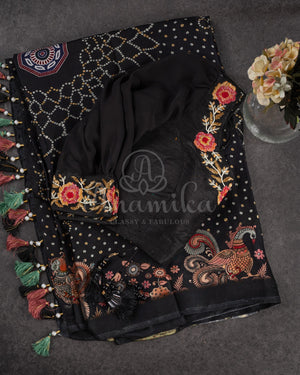 Stunning Black Crepe saree with bandini print and a gorgeous balloon sleeves blouse