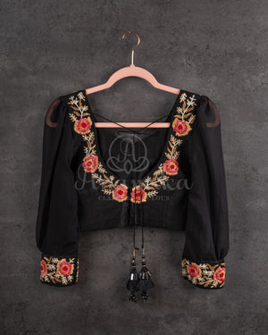 Stunning Black Crepe saree with bandini print and a gorgeous balloon sleeves blouse