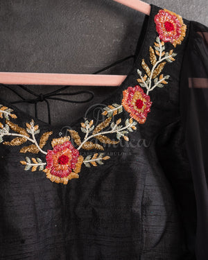 Stunning Black Crepe saree with bandini print and a gorgeous balloon sleeves blouse