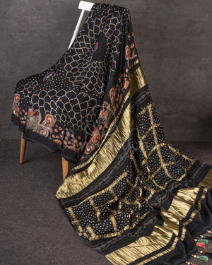 Stunning Black Crepe saree with bandini print and a gorgeous balloon sleeves blouse