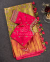 A tissue kanjeevaram saree in parrot green with pink border