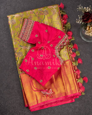 A tissue kanjeevaram saree in parrot green with pink border