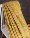 A tissue kanjeevaram saree in parrot green with pink border