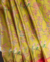 A tissue kanjeevaram saree in parrot green with pink border